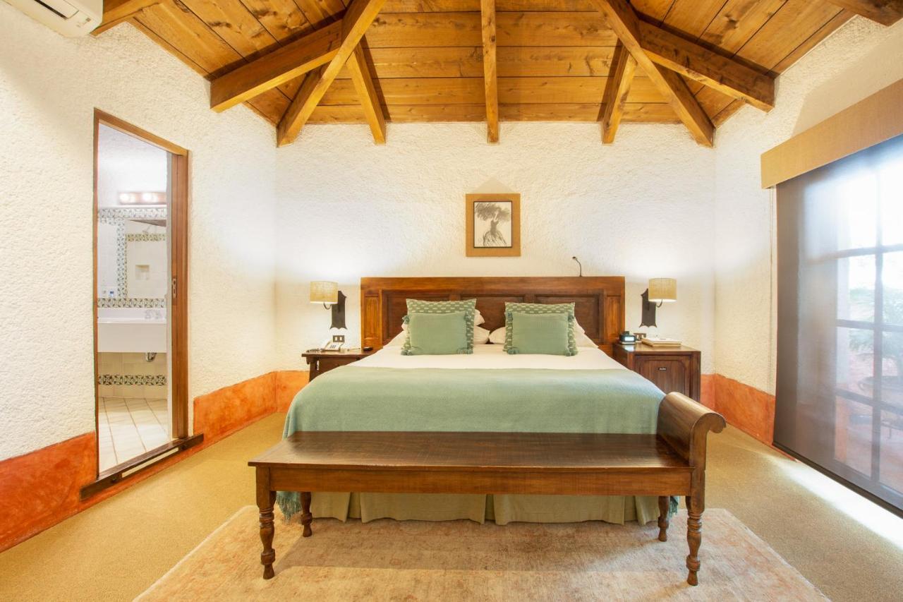 호텔 무제오 카사 산토 도밍고 안티구아 과테말라 외부 사진 A bedroom at the hotel